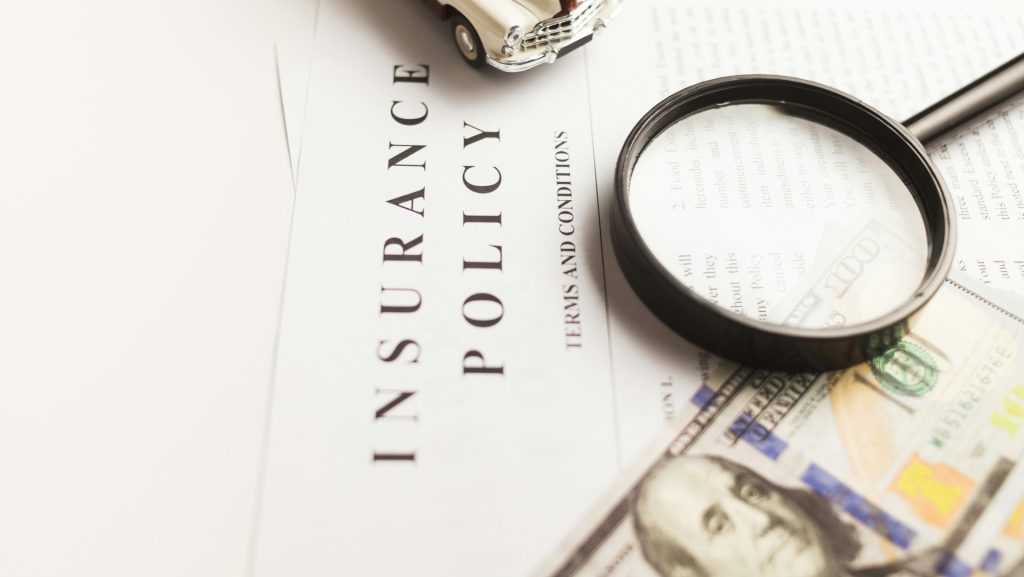 a magnifying glass sitting on top of a piece of paper